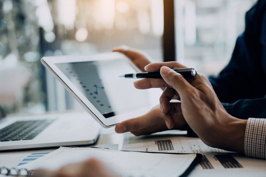 People working together on a tablet