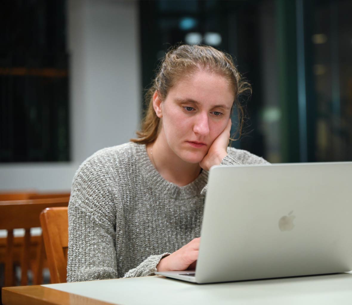 Student studying at library